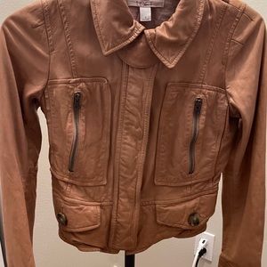 Leather jacket great color and fits snug and sexy waist